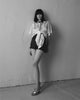 Elegant black & white short set with Nina Rajak logo