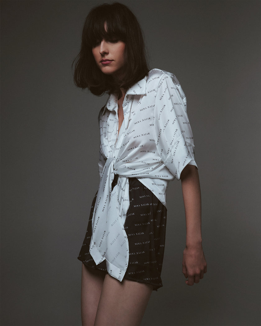 Elegant black & white short set with Nina Rajak logo