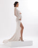 Sophisticated mermaid wedding dress with half roll, open back and deep slit