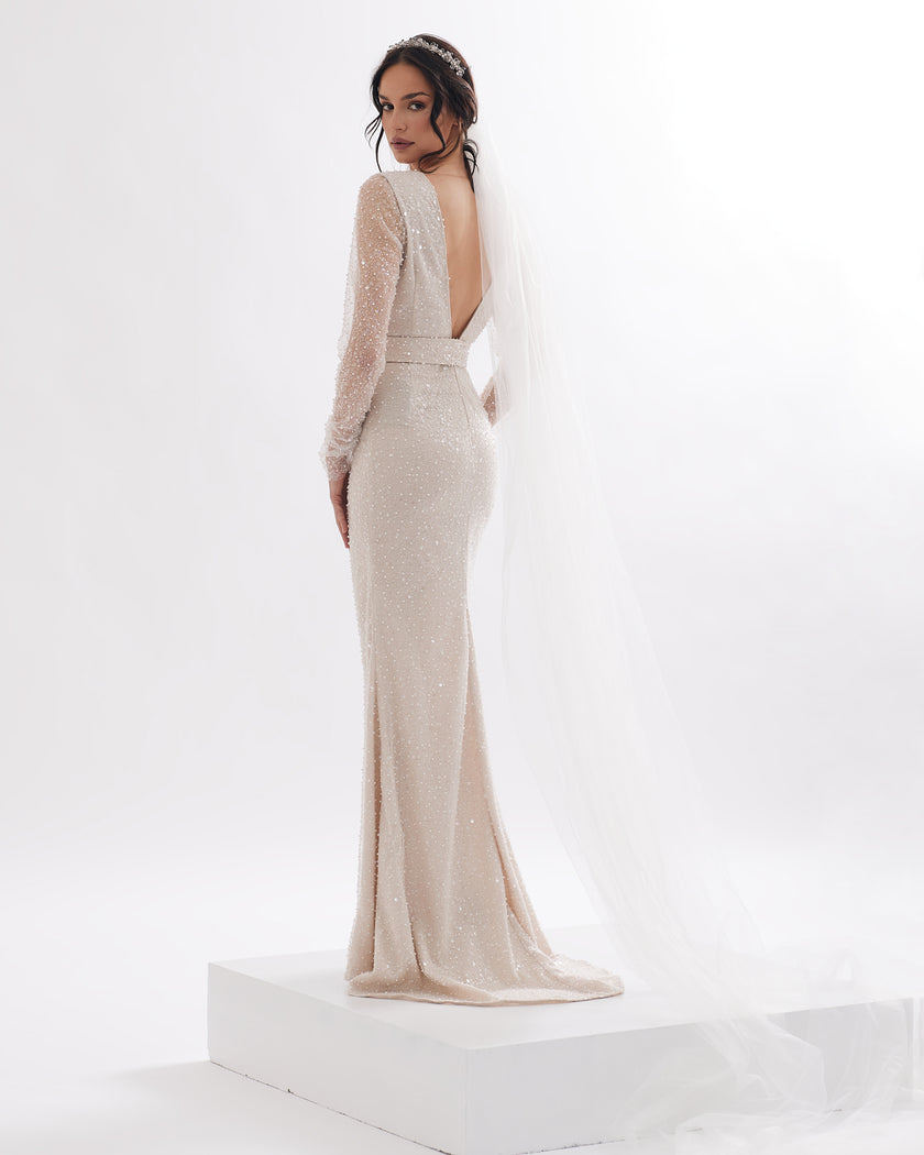 Sophisticated wedding dress with crystals, square neckline and transparent sleeves