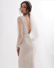 Sophisticated wedding dress with crystals, square neckline and transparent sleeves
