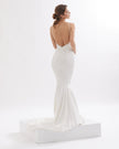 Refined mermaid wedding dress with pearls and open back