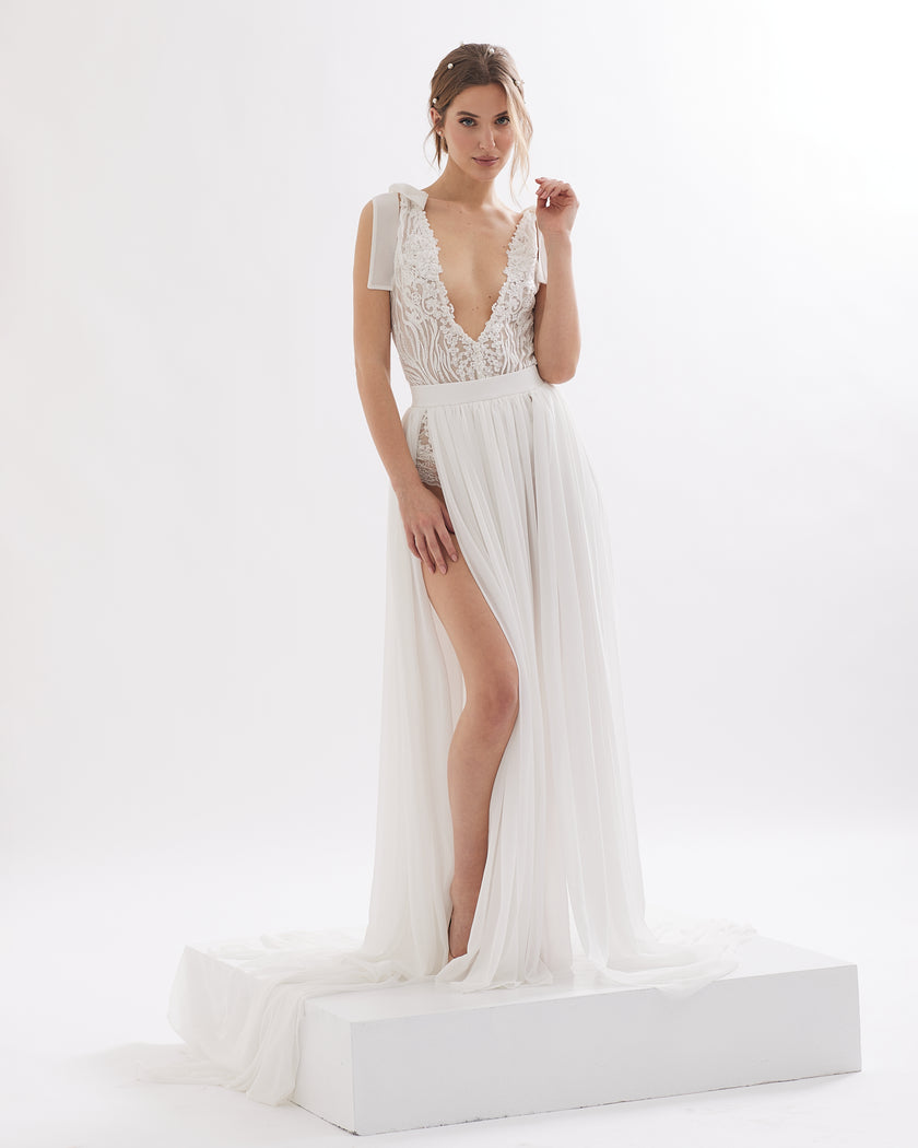 Two-piece unique wedding dress  with handmade lace, bows and slits