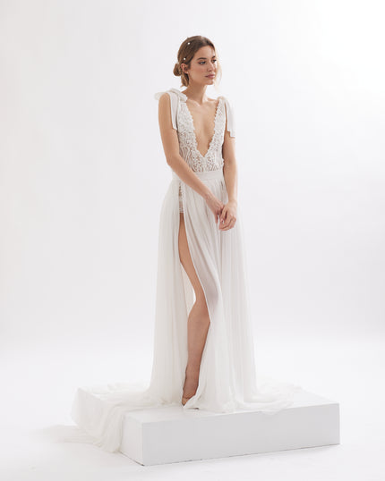 Two-piece unique wedding dress  with handmade lace, bows and slits