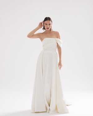 Modern corset-style wedding dress with pleats and dropped straps