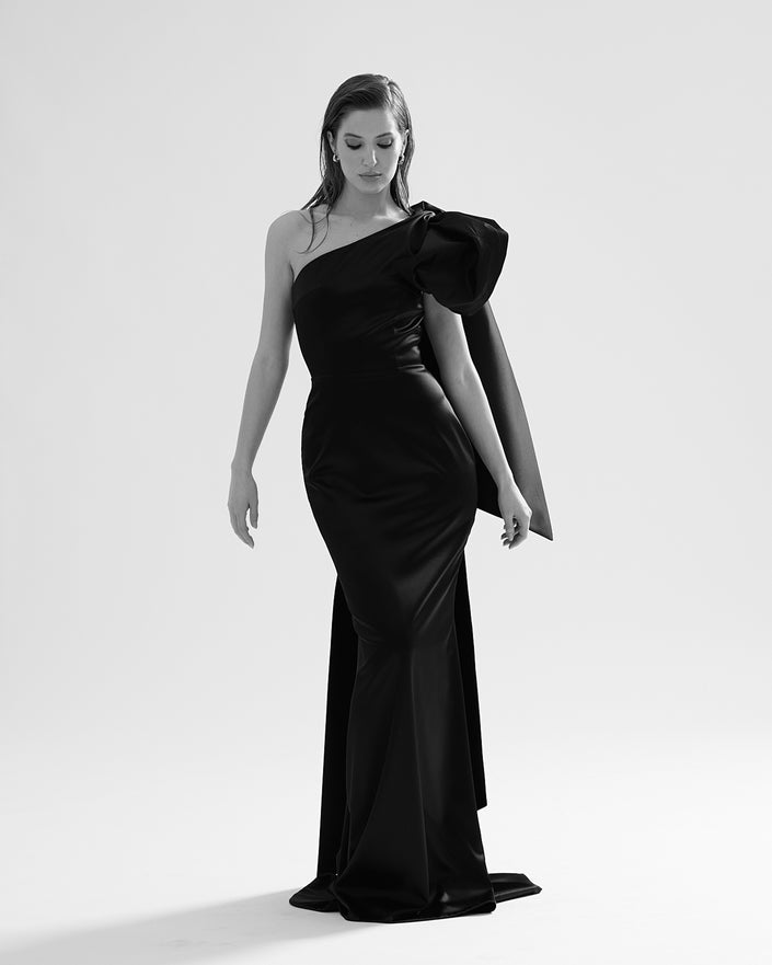 Modern one-shoulder long black mermaid dress with shoulder bow