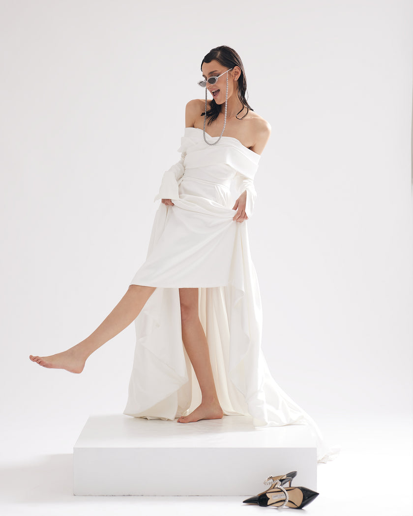 Glamorous wedding dress with open shoulders and sleeves