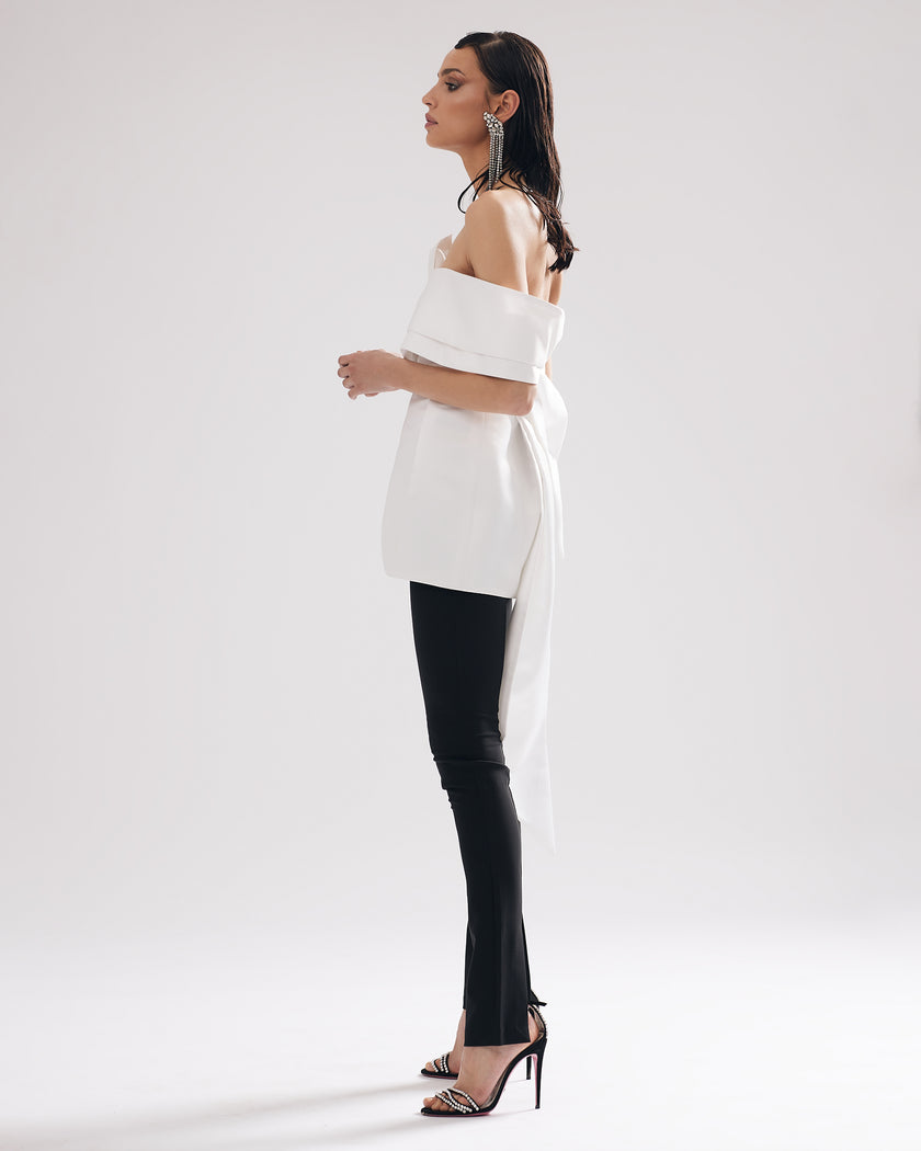 Little white statement dress with a unique detail