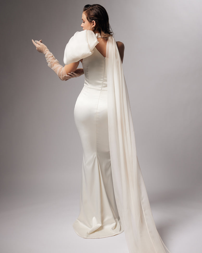 Unique mermaid cut wedding dress with neck detail and puff bow