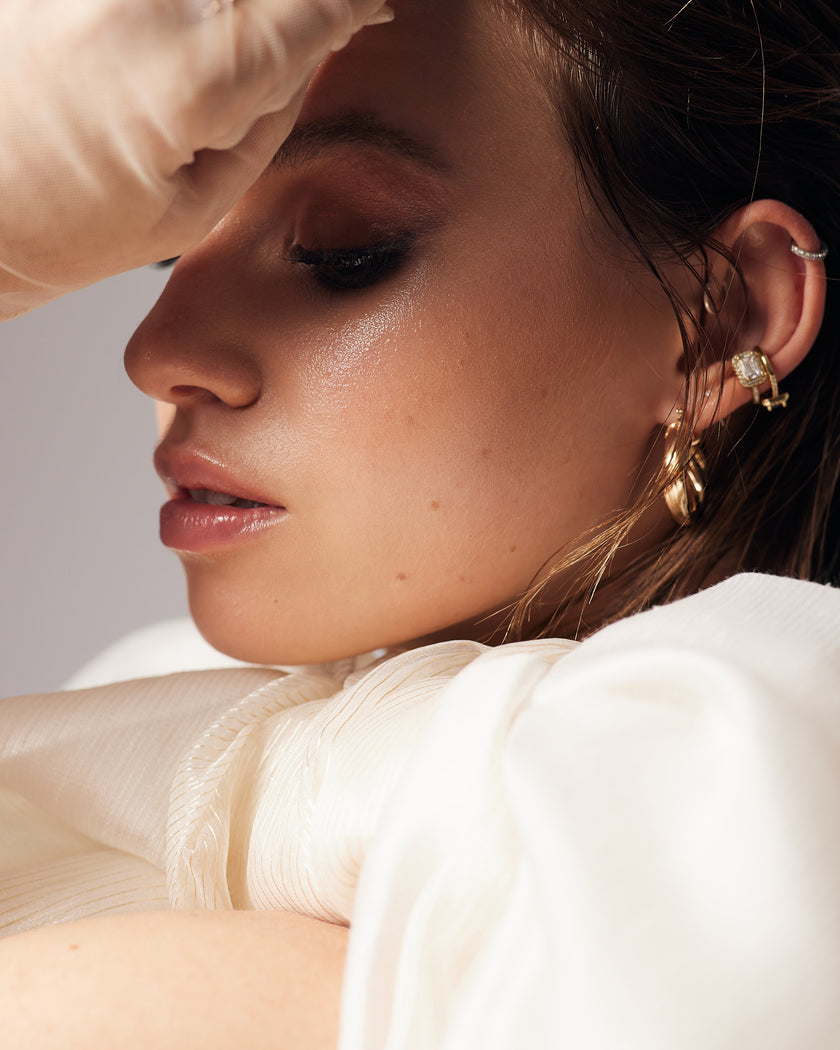 Unique mermaid cut wedding dress with neck detail and puff bow